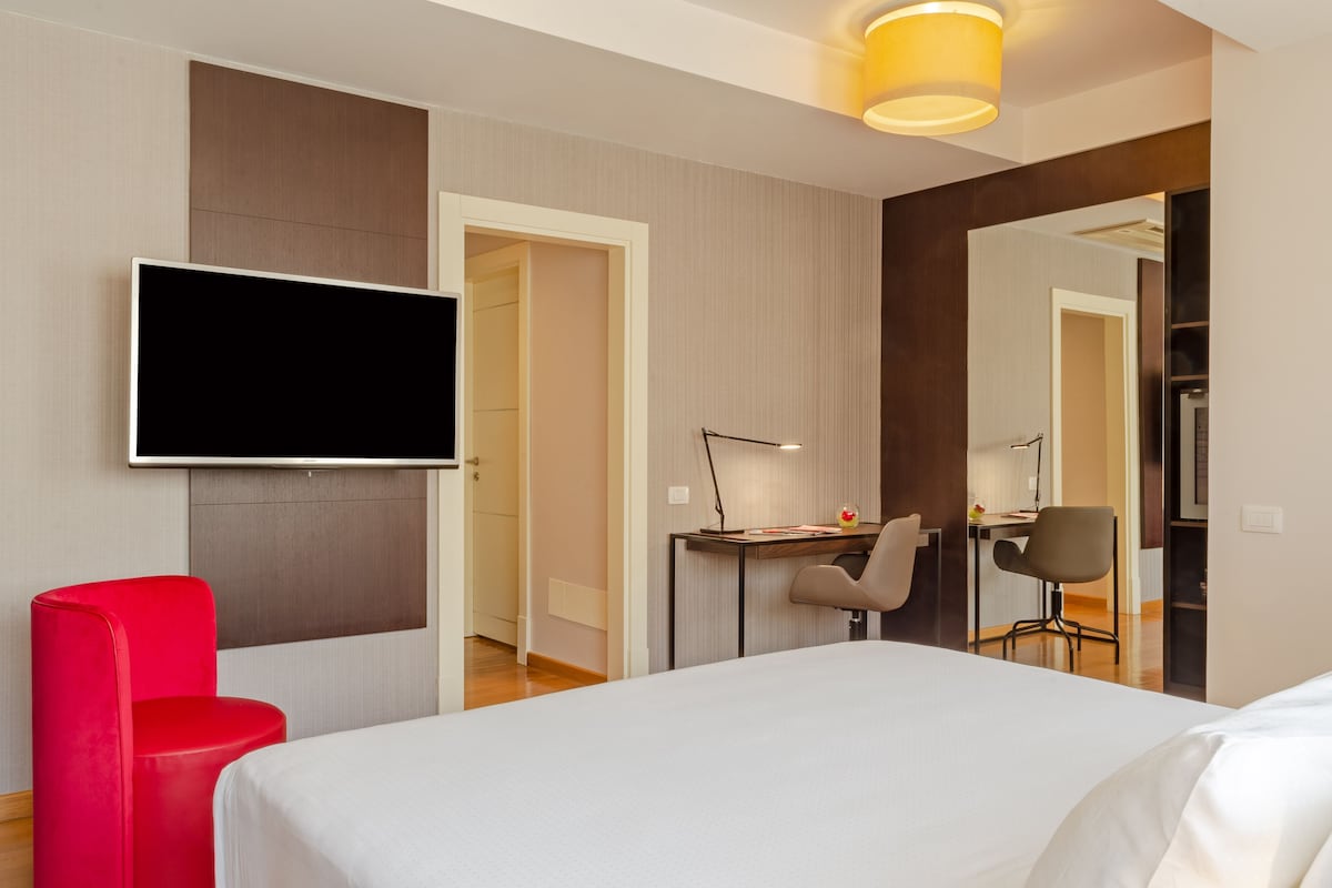Junior Suite con vista e balcone (2 adulti + 1 bambino)